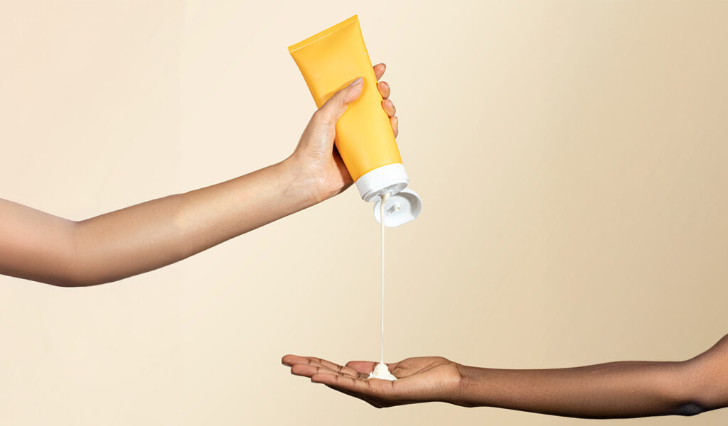 Inside Beauty Product Recalls 7 beauty product recalls-sunscreen in hand